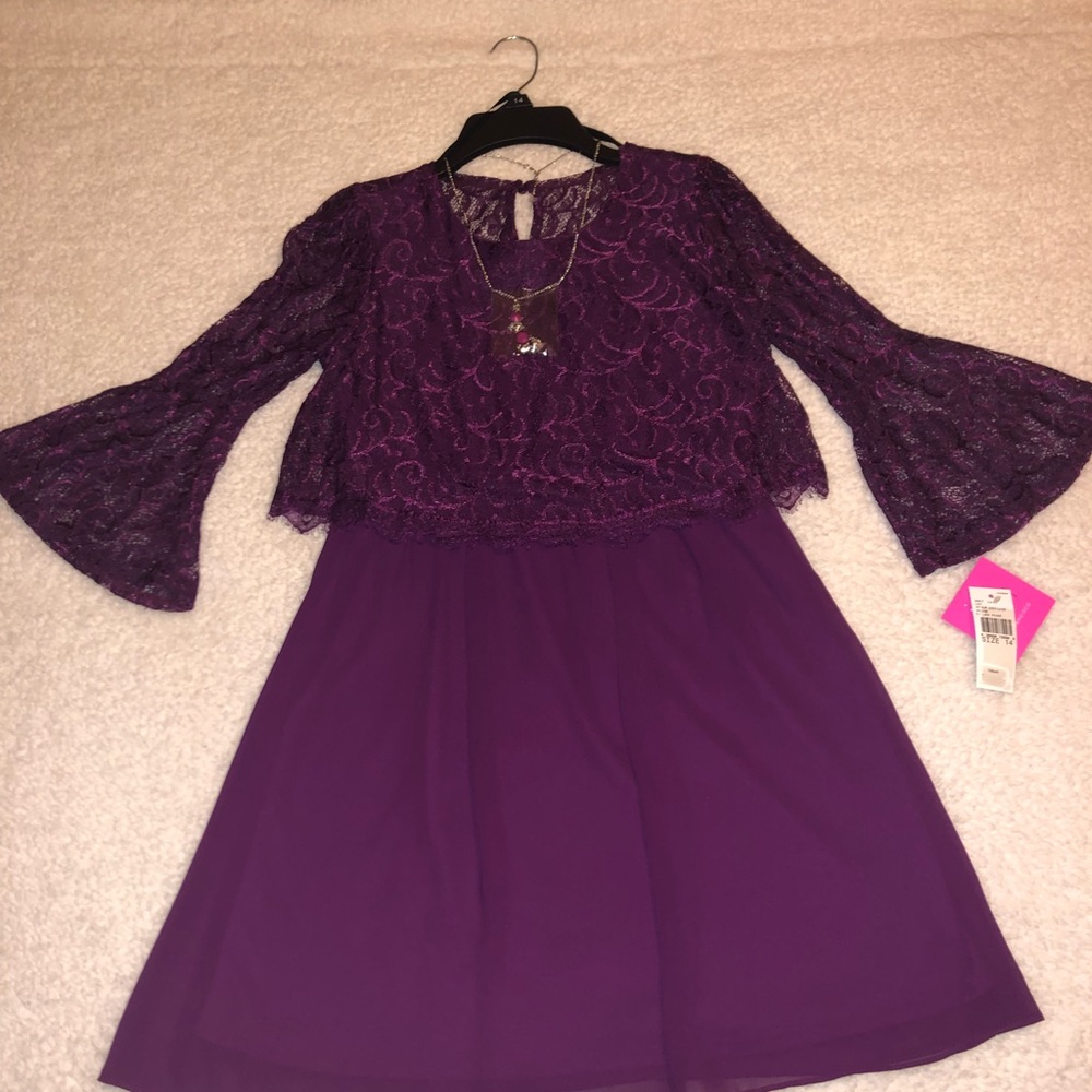 Cute lace plum girls dress. New with tags.